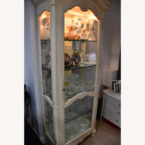Used Wood/Glass White Oak Media Storage/Curio Cabinet for sale on AptDeco