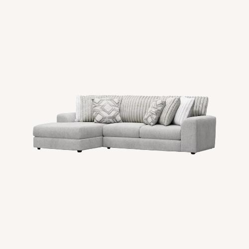 Used Rooms To Go Light Gray 2 Piece Sectional for sale on AptDeco