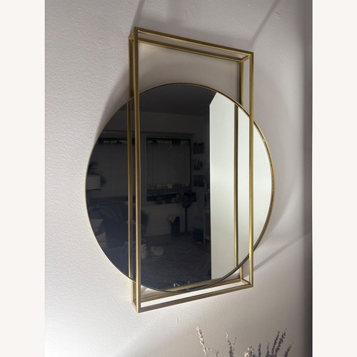 Used Round Framed Wall Mirror for sale on AptDeco