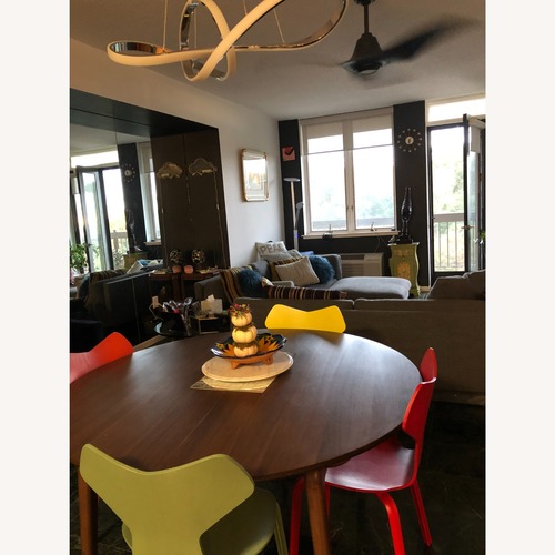 Used Elevate Your Home with Lively Color – Designer Chairs. for sale on AptDeco