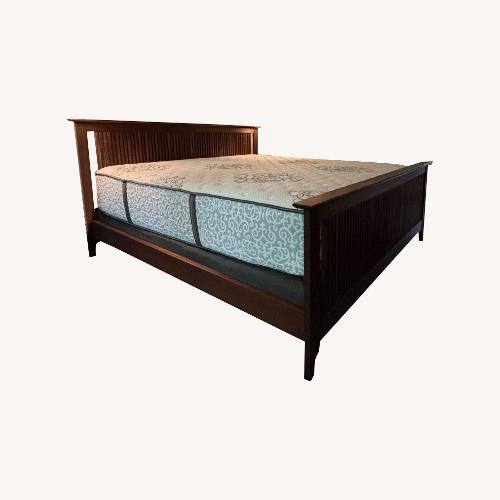 Used California Misson Dark Brown Wood King Bed for sale on AptDeco