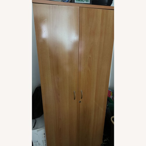Used Natural Wood Armoire for sale on AptDeco