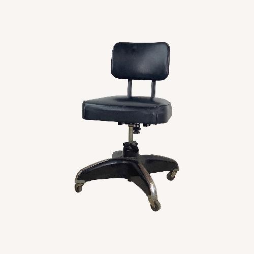 Used Vintage Industrial Rolling Steel Tanker Chair for sale on AptDeco