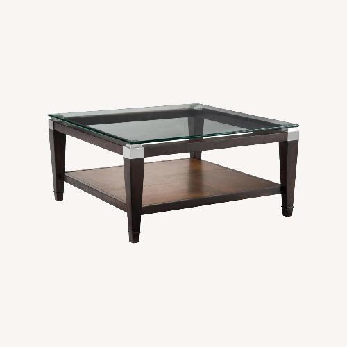 Used Raymour & Flanigan Dunhill Dark Brown Wood Coffee Table for sale on AptDeco