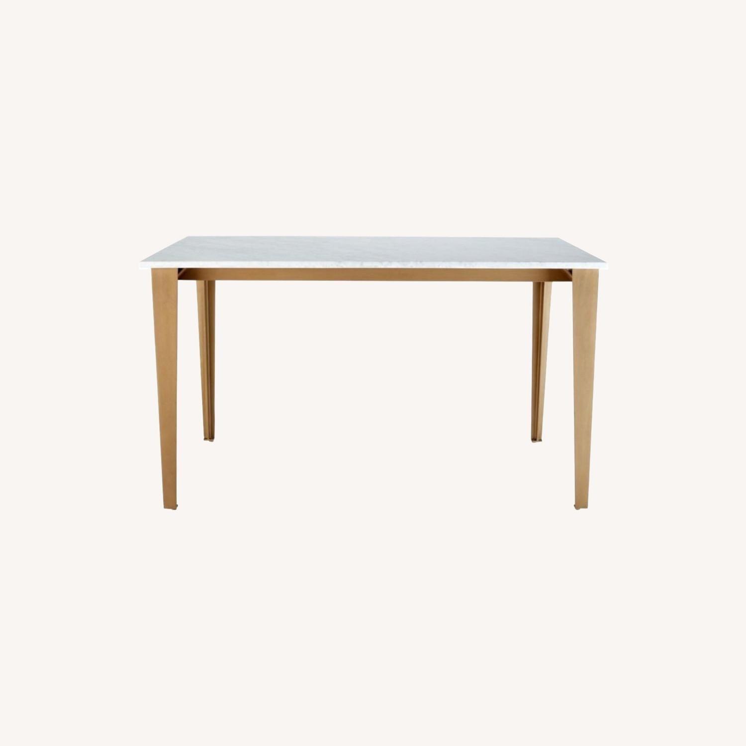 CB2 Paradigm 54" Carrara Marble Brass Dining Table - image-0