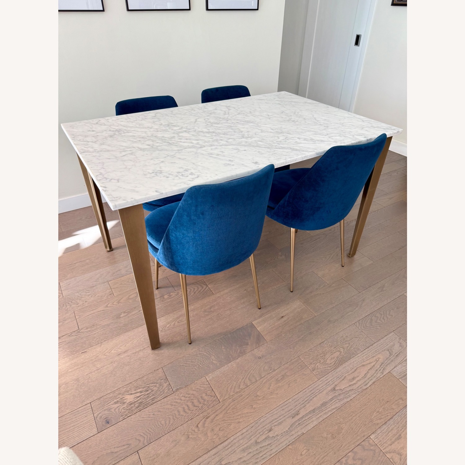 CB2 Paradigm 54" Carrara Marble Brass Dining Table - image-2