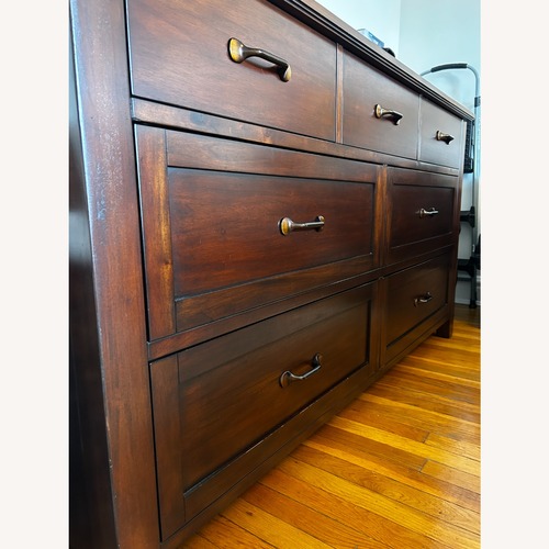 Used Pottery Barn Dark Brown Wood Dresser for sale on AptDeco