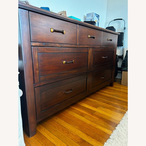 Used Pottery Barn Dark Brown Wood Dresser for sale on AptDeco