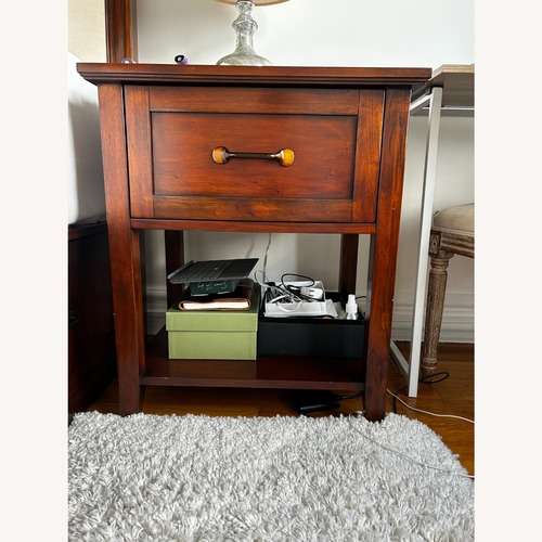 Used Pottery Barn Dark Brown Wood Nightstands for sale on AptDeco