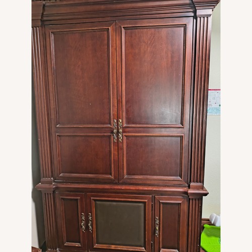 Used Ashley Furniture Wood Armoire for sale on AptDeco