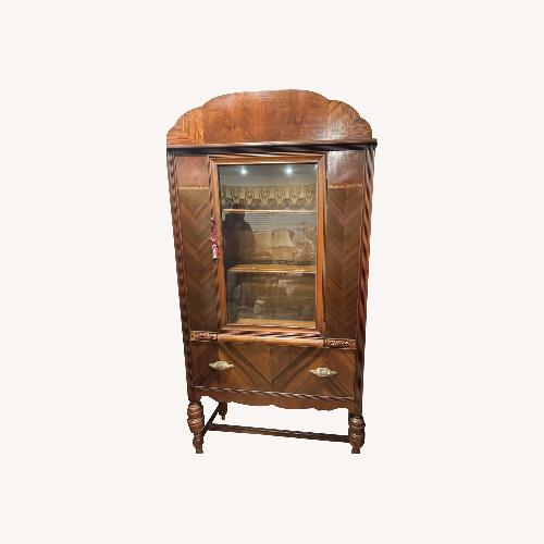 Used Dark Brown Wood Wall Unit for sale on AptDeco