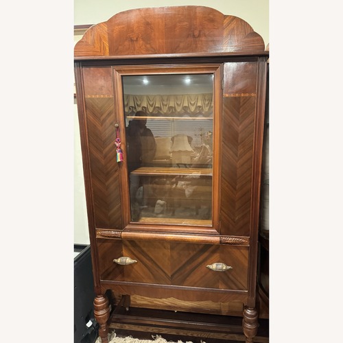 Used Dark Brown Wood Wall Unit for sale on AptDeco