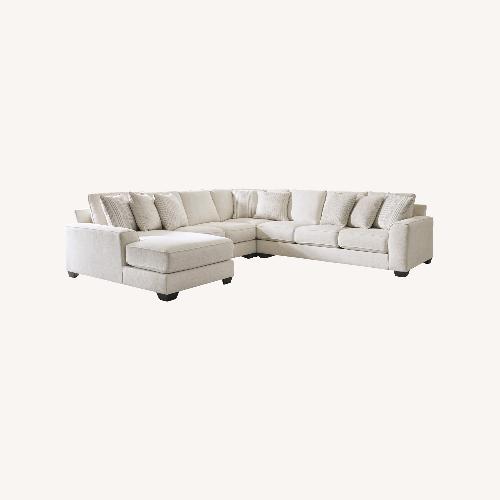 Used Ashley Furniture Lerenza 4-Piece Sectional with Chaise for sale on AptDeco