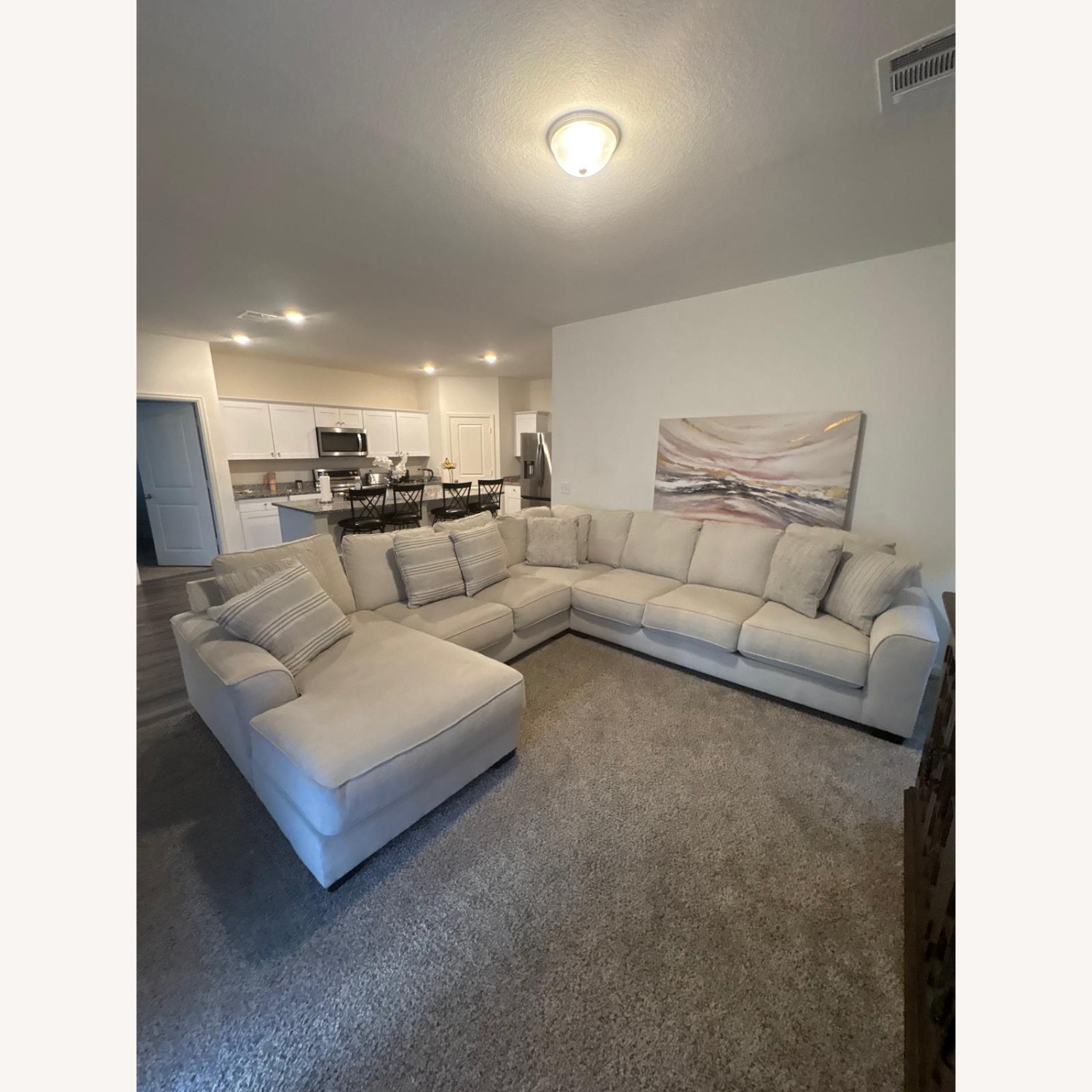 Ashley Furniture Lerenza 4-Piece Sectional with Chaise - image-1