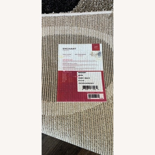 Used Enchant Rug by Loloi – 9’ x 12’ – Ivory & Multi for sale on AptDeco