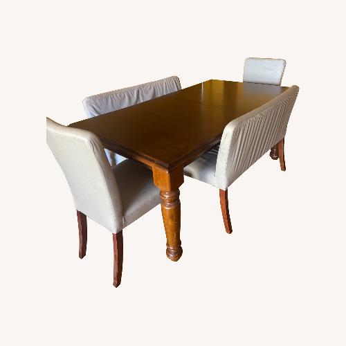 Used Pottery Barn San Francisco Table + 4 Chairs for sale on AptDeco