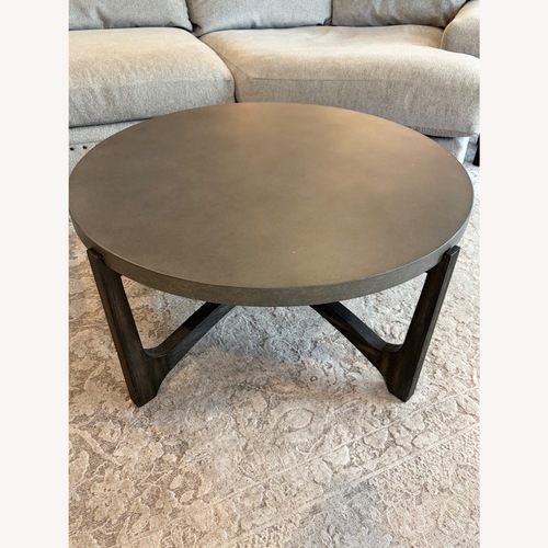 Used Raymour & Flanigan Gerald Round Coffee Table for sale on AptDeco