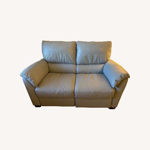 Used Natuzzi Light Gray Leather Loveseat for sale on AptDeco