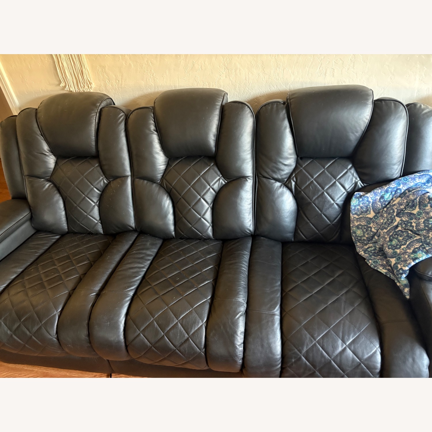 Bob’s Furniture Leather Reclining Sofa - image-1