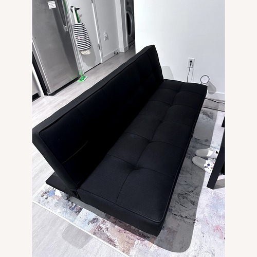 Used Black Fabric Futon for sale on AptDeco