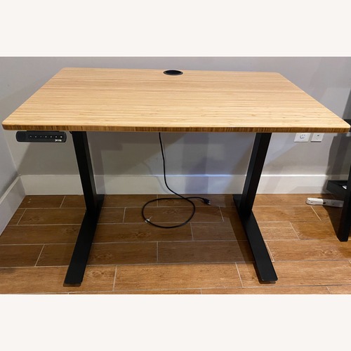 Used Jarvis Adjustable Standing Laminate Desk for sale on AptDeco