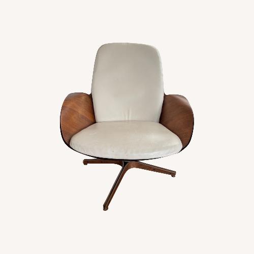 Used Vintage/Antique Dark Brown Wood Armchair for sale on AptDeco