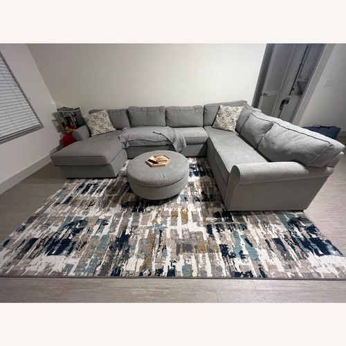 Used Living Spaces 3-Piece Sectional + Storage Ottoman for sale on AptDeco