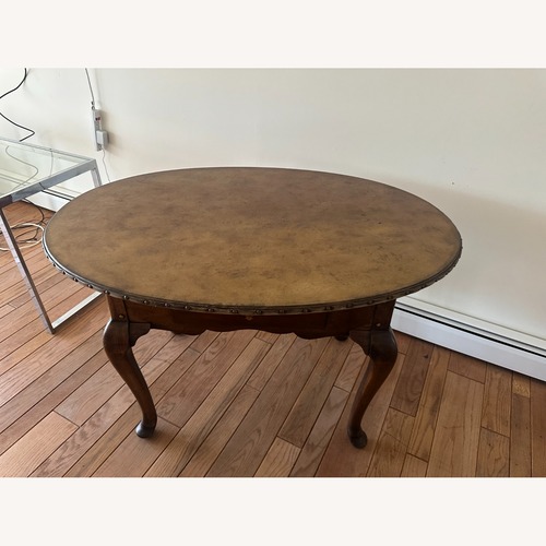 Used Dark Brown Wood Dining Table for sale on AptDeco
