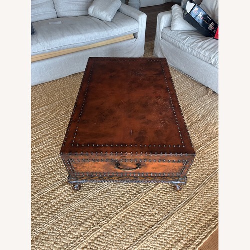 Used Dark Brown Wood Coffee Table for sale on AptDeco