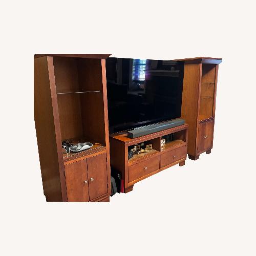 Used Raymour & Flanigan Dark Brown Wood Wall Unit for sale on AptDeco