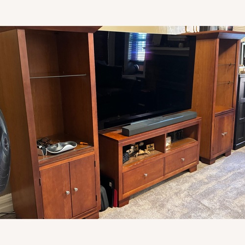 Used Raymour & Flanigan Dark Brown Wood Wall Unit for sale on AptDeco