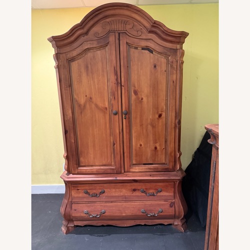 Used Romweber Solid Wood Armoire for sale on AptDeco