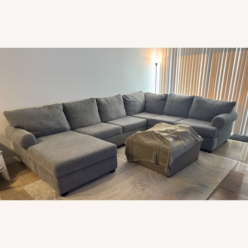 Used Living Spaces Hampstead 137” Gray Sectional for sale on AptDeco