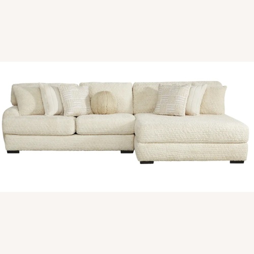 Used Rooms To Go Chandler White Fabric 2 Piece Sectional for sale on AptDeco