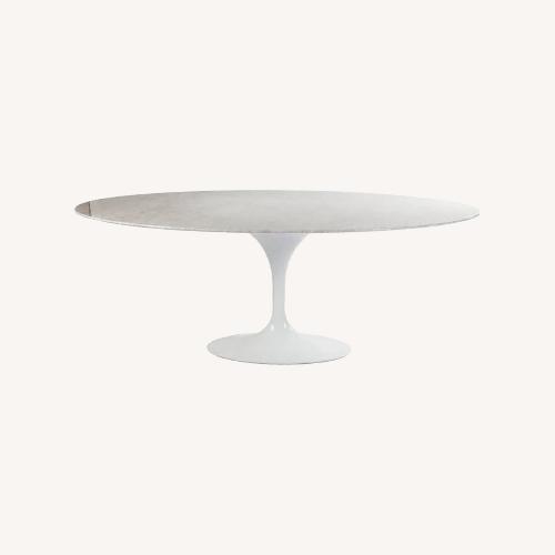 Used Carrara White Marble Tulip Base Dining Table for sale on AptDeco