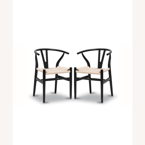 Used Poly and Bark Black Wishbone Dining Chairs for sale on AptDeco