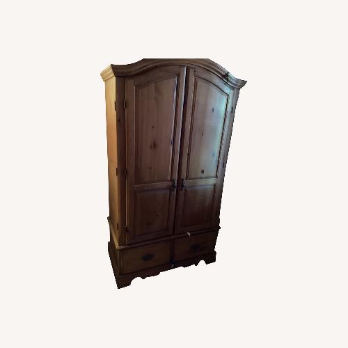 Used Dark Brown Armoire for sale on AptDeco