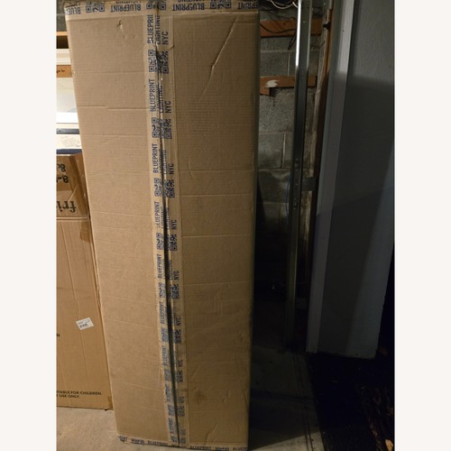 Used Blueprint NYC Counterbalance 2- Tier Chandelier for sale on AptDeco