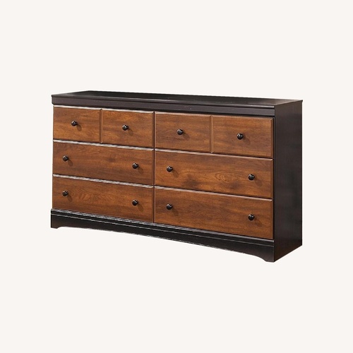 Used Raymour & Flanigan Dark Brown Wood Dresser for sale on AptDeco