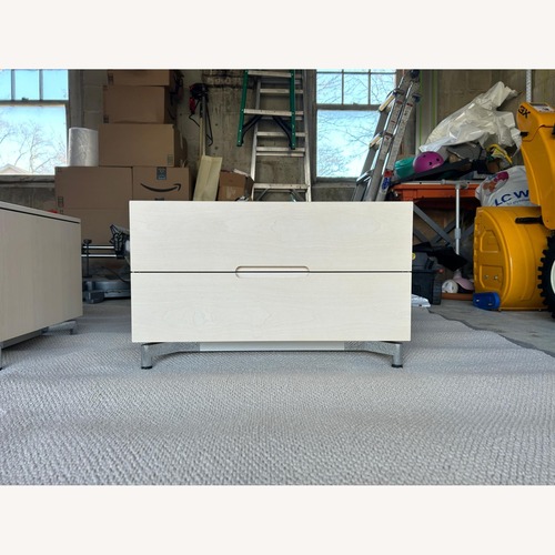 Used Pair of Mid-Century Modern Light Wood Nightstands for sale on AptDeco