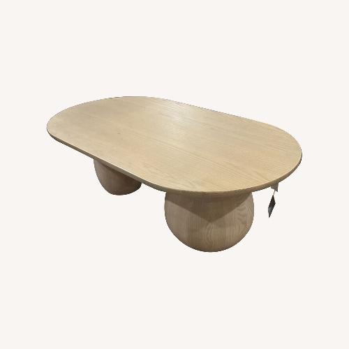 Used Lulu and Georgia Oval Solid Wood Coffee Table for sale on AptDeco