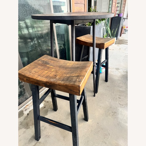 Used Pottery Barn Griffin Dark Brown Wood Patio Furniture for sale on AptDeco