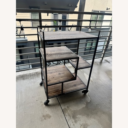Used Four Hands Helena Dark Brown Wood Bar Cart for sale on AptDeco
