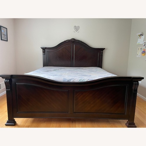 Used New Classic Furniture Co Dark Brown Wood King Bed for sale on AptDeco