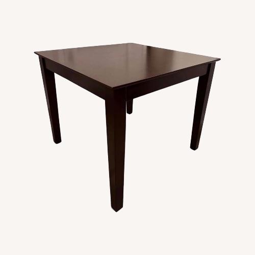 Used Dark Brown & Cream Wood Dining Set for sale on AptDeco