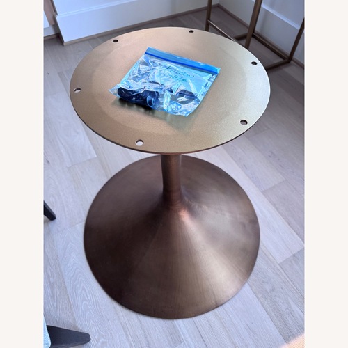 Used Restoration Hardware Aero Round Dining Table 72" for sale on AptDeco