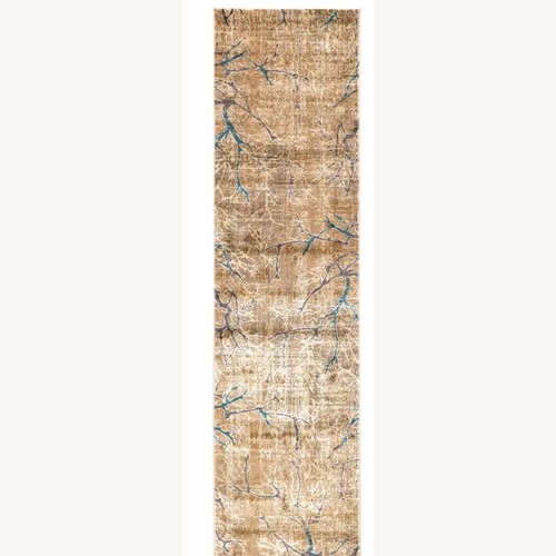 Used Light Brown Runner Rug 10' x 27' for sale on AptDeco