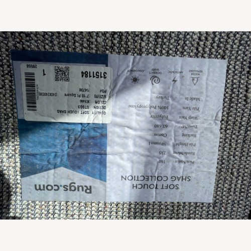 Used Soft Touch Shag Collection Area Rug 8' x 11' for sale on AptDeco