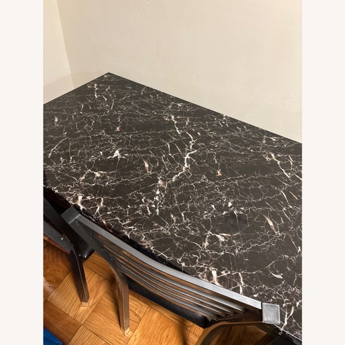 Used Faux Marble Dining Table With 4 Chairs  for sale on AptDeco