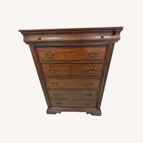 Used Raymour & Flanigan Dark Brown Wood Dresser for sale on AptDeco